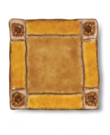 A hand-painted floral motif rooted in traditional Italian pottery gives the Tuscan Sunflower dinner plates a decidedly rustic charm. A hand-painted floral motif rooted in traditional Italian pottery gives the Tuscan Sunflower dinner plates a decidedly rustic charm.