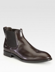A sartorial staple handsomely crafted in Italy from luxurious leather with side elastic gores for tailored, comfortable fit.Leather upperLeather liningPadded insoleRubber soleMade in Italy A sartorial staple handsomely crafted in Italy from luxurious leather with side elastic gores for tailored, comfortable fit.Leather upperLeather liningPadded insoleRubber soleMade in Italy