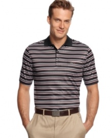 Bold horizontal golf shirt by Greg Norman for Tasso Elba has silhouettes of multi-circles on each stripe will make you a style standout and keep you dry with its unique wick away moisture fabric.