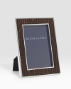 An elegant, silverplated brass frame, wrapped in alligator-embossed leather. Arrives in a gift box Accommodates a 4 X 6 photograph Overall: 6 X 8 Imported 