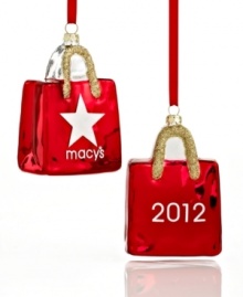 Start your holiday shopping season off right! The Macy's Red Bag ornament from Holiday Lane makes a great gift for Christmas 2012, shining in brilliant red glass with gold glitter. Shown front and back. Start your holiday shopping season off right! The Macy's Red Bag ornament from Holiday Lane makes a great gift for Christmas 2012, shining in brilliant red glass with gold glitter. Shown front and back.