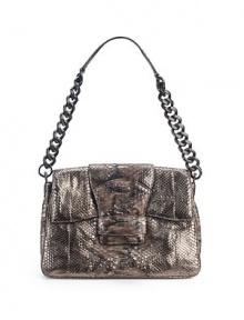 THE LOOKRectangular silhouette of metallic pythonMagnetic flap with strap tab closureRemovable handmade wood shoulder chainOne outside open pocketThree center compartmentsOne inside zip pocketOne inside open pocket with metal logoTHE FITShoulder chain, 13 drop12W X 8½H X 3DTHE MATERIALMetallic pythonMicrofiber liningORIGINMade in Italy THE LOOKRectangular silhouette of metallic pythonMagnetic flap with strap tab closureRemovable handmade wood shoulder chainOne outside open pocketThree center compartmentsOne inside zip pocketOne inside open pocket with metal logoTHE FITShoulder chain, 13 drop12W X 8½H X 3DTHE MATERIALMetallic pythonMicrofiber liningORIGINMade in Italy