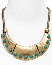 Channel your inner Egyptian goddess with this hammered gold tone necklace embellished with turquoise stones. The rope chain lays just right.