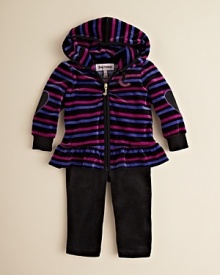 Juicy Couture updates the velour hoodie and pant look with vivid stripes and generous ruffle accents at the hem. Juicy Couture updates the velour hoodie and pant look with vivid stripes and generous ruffle accents at the hem.