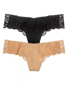 Commando's luxurious soft thong gets a sultry update with a thick lace waistband. Commando's luxurious soft thong gets a sultry update with a thick lace waistband.