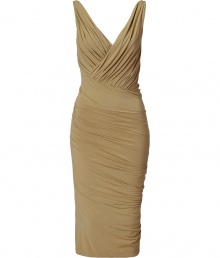 The ultimate figure-hugging dress, this draped Donna Karan favorite will have you turning heads while maintaining comfort - V-neckline with faux wrap detail, sleeveless, front and back twist drape detail, fitted pencil silhouette - Style with statement sandals, a draped front leather jacket, and a studded clutch