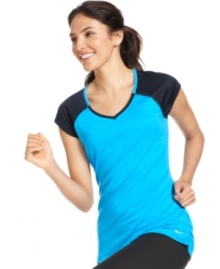 Stay stylish as you get in shape with this Dri-FIT tee from Nike. With its bright colors and moisture-wicking technology, you're guaranteed to look as good as you feel.