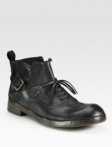 Expertly crafted in rich Italian leather, with lace-up and buckle detail, for a rugged, vintage appeal.Leather upperLeather liningPadded insoleLeather soleMade in Italy Expertly crafted in rich Italian leather, with lace-up and buckle detail, for a rugged, vintage appeal.Leather upperLeather liningPadded insoleLeather soleMade in Italy