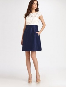 Beautifully crocheted lace meets lustrous silk, in this elegant style.Jewel necklineCap sleevesBanded waistSide slash pocketsConcealed back zipFully linedAbout 24 from natural waistBodice: polyesterSkirt: silkDry cleanImportedModel shown is 5'10½ (179cm) wearing US size 4. Beautifully crocheted lace meets lustrous silk, in this elegant style.Jewel necklineCap sleevesBanded waistSide slash pocketsConcealed back zipFully linedAbout 24 from natural waistBodice: polyesterSkirt: silkDry cleanImportedModel shown is 5'10½ (179cm) wearing US size 4.