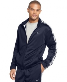 Dress the part of a pro athlete when you suit up in the ultra-smooth performance style of this Dri-Fit track jacket from Nike. Dress the part of a pro athlete when you suit up in the ultra-smooth performance style of this Dri-Fit track jacket from Nike.