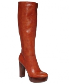 The perfect fashion alibi. Nine West's Escapegoat tall boots feature a smooth almond toe and a chunky, stacked platform and heel. The perfect fashion alibi. Nine West's Escapegoat tall boots feature a smooth almond toe and a chunky, stacked platform and heel.