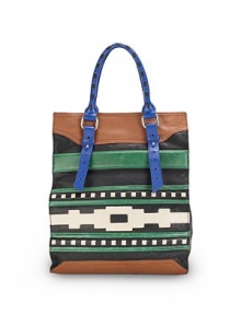 THE LOOKAdjustable, contrast tubular leather double top handlesOpen topFront multicolor tribal-inspired cutout leather designOne outside zip pocketOne inside zip pocketTwo inside open pocketsInside logo detailTHE MEASUREMENTDouble top handles, 6 drop12W X 14H X 5½DTHE MATERIALLeatherLogo printed liningORIGINImported THE LOOKAdjustable, contrast tubular leather double top handlesOpen topFront multicolor tribal-inspired cutout leather designOne outside zip pocketOne inside zip pocketTwo inside open pocketsInside logo detailTHE MEASUREMENTDouble top handles, 6 drop12W X 14H X 5½DTHE MATERIALLeatherLogo printed liningORIGINImported
