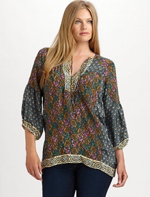 A contrasting tribal print flawlessly complements this printed silk top. Pair this relaxed-fit blouse with slim-fitting pants or skinny jeans.Self-tie detail at necklineThree-quarter sleevesAllover printContrasting trimBack yokeAbout 29 from shoulder to hemSilkDry cleanImported