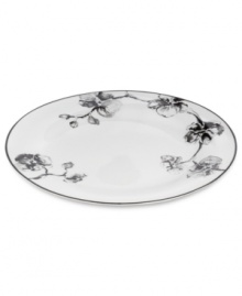 Compose a striking arrangement with the Black Orchid oval platter by Michael Aram. Fine white Limoges porcelain flourishes under a dark watercolor motif inspired by foliage from around the world. Compose a striking arrangement with the Black Orchid oval platter by Michael Aram. Fine white Limoges porcelain flourishes under a dark watercolor motif inspired by foliage from around the world.