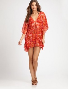 An airy design complemented by a pretty print, flutter sleeves and a flattering empire waist.V-neckFlutter sleevesEmpire waistSelf-tieSilkDry cleanImported An airy design complemented by a pretty print, flutter sleeves and a flattering empire waist.V-neckFlutter sleevesEmpire waistSelf-tieSilkDry cleanImported