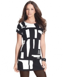 With a striking intarsia design, Alfani's tunic will look gorgeous with leggings and booties. With a striking intarsia design, Alfani's tunic will look gorgeous with leggings and booties.
