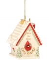 Gather loved ones under one roof with the Bless Our Home ornament by Lenox. A Christmas cardinal peeks out of a deluxe bird house, crafted of fine ivory porcelain with touches of red, green and gold. With 2012 hangtag.