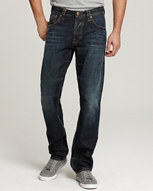 The Average Joe features an easy straight leg from the thigh to the bottom hem. Features Nudie's signature orange stitching and back pocket embroidery. The Average Joe features an easy straight leg from the thigh to the bottom hem. Features Nudie's signature orange stitching and back pocket embroidery.
