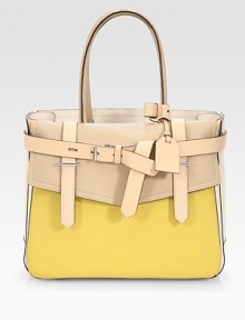 A versatile silhouette of sumptuous leather, finished with a tailored flap front and buckled belt.Double top handles, 8 dropOne outside flap snap pocketOne outside snap pocketProtective metal feetCenter zip compartmentOne inside zip pocketTwo inside open pocketsCotton lining10¾W X 14½H X 4½DImported A versatile silhouette of sumptuous leather, finished with a tailored flap front and buckled belt.Double top handles, 8 dropOne outside flap snap pocketOne outside snap pocketProtective metal feetCenter zip compartmentOne inside zip pocketTwo inside open pocketsCotton lining10¾W X 14½H X 4½DImported