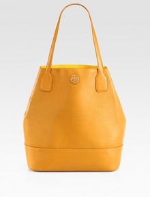 Luxurious pebbled leather in a roomy carryall with a signature logo emblem and a bright patent leather lining.Double shoulder straps, 9 dropCenter buckled strap closurePatent leather lining12¼W X 14H X 7DImported Luxurious pebbled leather in a roomy carryall with a signature logo emblem and a bright patent leather lining.Double shoulder straps, 9 dropCenter buckled strap closurePatent leather lining12¼W X 14H X 7DImported