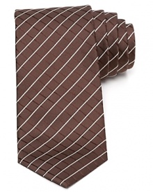 Classic stripes are offset with tonal diagonals to create a handsome, subtle grid pattern on this refined tie rendered in premium Italian silk. Classic stripes are offset with tonal diagonals to create a handsome, subtle grid pattern on this refined tie rendered in premium Italian silk.