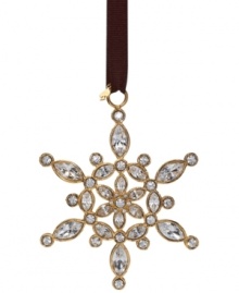 Create a winter wonderland like no other with the Ice Queen Snowflake ornament from kate spade new york. Dazzling crystal gems set in gold plate lend unparalleled shine to the season. With spade charm.