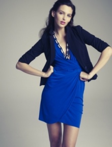 Dress up a sheath or wrap dress with this sleek blazer by Eliza J.