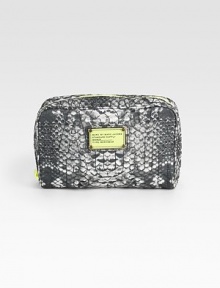 Stash your beauty essentials in this chic zip-top nylon pouch finished with signature letter stitching.Top zip closureCenter zip compartmentTwo inside open pocketsFully lined8W X 6H X 2DImported Stash your beauty essentials in this chic zip-top nylon pouch finished with signature letter stitching.Top zip closureCenter zip compartmentTwo inside open pocketsFully lined8W X 6H X 2DImported