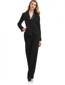 THE LOOKSatin banded collarLightly padded shouldersConcealed front button closureLong sleeves with concealed button cuffsTwo front welt pocketsPrincess seamsBack ventTHE FITAbout 24 from shoulder to hemTHE MATERIALBody: 65% triacetate/35% polyamideTrim: polyesterSilk linedCARE & ORIGINDry cleanMade in USA THE LOOKSatin banded collarLightly padded shouldersConcealed front button closureLong sleeves with concealed button cuffsTwo front welt pocketsPrincess seamsBack ventTHE FITAbout 24 from shoulder to hemTHE MATERIALBody: 65% triacetate/35% polyamideTrim: polyesterSilk linedCARE & ORIGINDry cleanMade in USA