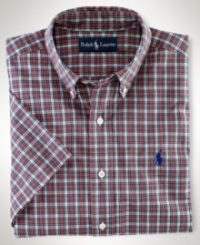 Cut for a relaxed, classic fit, a short-sleeved sport shirt is crafted from crisp cotton poplin in traditional tartan plaid for an authentic look. Cut for a relaxed, classic fit, a short-sleeved sport shirt is crafted from crisp cotton poplin in traditional tartan plaid for an authentic look.