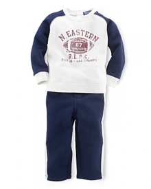This coordinating athletic set includes a classic crewneck fleece pullover and matching sweatpant with contrast stripes for an authentic sporty look This coordinating athletic set includes a classic crewneck fleece pullover and matching sweatpant with contrast stripes for an authentic sporty look