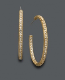 Sparkle from every angle. Eliot Danori's chic crystal hoops feature an in and out design. Crafted in gold tone mixed metal. Approximate diameter: 1 inch. Sparkle from every angle. Eliot Danori's chic crystal hoops feature an in and out design. Crafted in gold tone mixed metal. Approximate diameter: 1 inch.