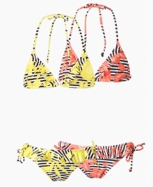 No one will have to read between the lines to know her warm-weather style in this exotic bikini from Roxy. No one will have to read between the lines to know her warm-weather style in this exotic bikini from Roxy.