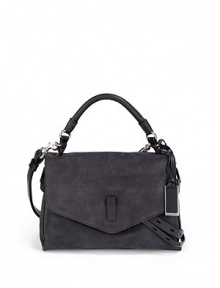 THE LOOKCalfskin body with cowhide trimRolled leather top handleRemovable, adjustable crossbody strap with shoulder padLogo ID tagFlap with concealed push-lock closureFront loop detailWrap-around belt under the flapExpandable side zip gussetsLeather-covered protective metal feetOne inside zip pocketOne inside open pocketInside logo detailTHE MEASUREMENTTop handle, 4 dropAdjustable crossbody strap THE LOOKCalfskin body with cowhide trimRolled leather top handleRemovable, adjustable crossbody strap with shoulder padLogo ID tagFlap with concealed push-lock closureFront loop detailWrap-around belt under the flapExpandable side zip gussetsLeather-covered protective metal feetOne inside zip pocketOne inside open pocketInside logo detailTHE MEASUREMENTTop handle, 4 dropAdjustable crossbody strap