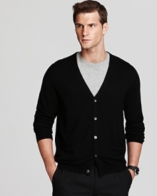 This dapper cardigan keeps you looking polished in soft and supple merino wool. Pair it with a handsome button-down for classic appeal. This dapper cardigan keeps you looking polished in soft and supple merino wool. Pair it with a handsome button-down for classic appeal.