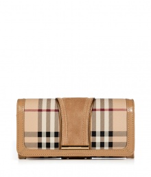 With its characteristic check and modern metallic piping, Burberry Londons continental wallet is an iconic way to keep your most valuable essentials organized - Haymarket check coated canvas, trench suede panel, matching leather trim, flap with snap closure, back slot pocket, multiple credit card slots inside, zippered coin purse - Carry alone for running quick errands, or stash away in a sophisticated leather tote