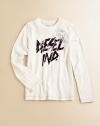 A crisp, long-sleeved cotton tee is adorned with a Diesel logo print for sharp style.CrewneckLong sleevesPullover styleCottonMachine washImported