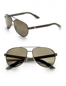 Lightweight metal frames with web stripe logo detail at temple. Available in palm green with grey gradient lens, blue white with smoke mirror gradient lens and shiny black/brown tortoise with grey gradient lens.100% UV protectionMade in Italy Lightweight metal frames with web stripe logo detail at temple. Available in palm green with grey gradient lens, blue white with smoke mirror gradient lens and shiny black/brown tortoise with grey gradient lens.100% UV protectionMade in Italy