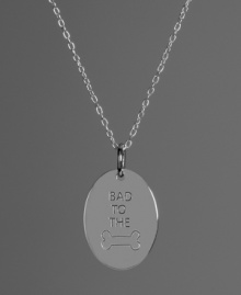 Show your love for your favorite furry friend. This oval-shaped pendant features the engraving BAD TO THE BONE in polished sterling silver. Approximate length: 18 inches. Approximate drop: 3/4 inch.