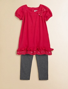 Sweet bows, sequins and ruffles adorn this adorable sweater tunic and leggings set. Tunic Ribbed roundneckShort puff sleevesBow and sequin accentsRuffled hemBack keyhole with button closure Leggings Elastic waistbandPull-on styleTunic: cotton/acrylicLeggings: cotton/spandexMachine washImported Sweet bows, sequins and ruffles adorn this adorable sweater tunic and leggings set. Tunic Ribbed roundneckShort puff sleevesBow and sequin accentsRuffled hemBack keyhole with button closure Leggings Elastic waistbandPull-on styleTunic: cotton/acrylicLeggings: cotton/spandexMachine washImported