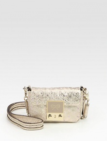Be the star of the party with this unique light-up design in luxurious crinkled leather.Detachable shoulder strap, 24½ dropPush-lock flap closureOne inside zip pocket with additional battery packCotton lining5W X 3½H X 2¼DImported Be the star of the party with this unique light-up design in luxurious crinkled leather.Detachable shoulder strap, 24½ dropPush-lock flap closureOne inside zip pocket with additional battery packCotton lining5W X 3½H X 2¼DImported