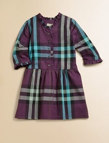 Familiar checks in unexpected colors on crisp cotton with pretty ruffled trim.Ruffled V necklineThree-quarter sleeves with ruffled cuffsButton placketSlightly dropped waist, softly gatheredTiny pleats at back necklineCottonMachine washImported Please note: Number of buttons may vary depending on size ordered. Familiar checks in unexpected colors on crisp cotton with pretty ruffled trim.Ruffled V necklineThree-quarter sleeves with ruffled cuffsButton placketSlightly dropped waist, softly gatheredTiny pleats at back necklineCottonMachine washImported Please note: Number of buttons may vary depending on size ordered.