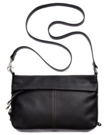 Wear with t-shirt and jeans or your favorite frilly frock, this versatile crossbody from Tignanello is the ultimate accessory. Clean lines, buttery-soft leather and subtle detail stitching grace the outside, while plenty of pockets and card slots inside can make your life feel more pulled together. Wear with t-shirt and jeans or your favorite frilly frock, this versatile crossbody from Tignanello is the ultimate accessory. Clean lines, buttery-soft leather and subtle detail stitching grace the outside, while plenty of pockets and card slots inside can make your life feel more pulled together.