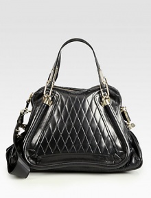 Chic embossed calfskin leather accented with goldtone hardware, perfectly sized for all your daily essentials.Detachable double top handles, 5 dropAdjustable shoulder strap, 6-13¾ dropTop zip closureThree inner compartmentsOne inside zip pocketOne inside open pocketCotton lining14½W X 9H X 5½DMade in Italy Chic embossed calfskin leather accented with goldtone hardware, perfectly sized for all your daily essentials.Detachable double top handles, 5 dropAdjustable shoulder strap, 6-13¾ dropTop zip closureThree inner compartmentsOne inside zip pocketOne inside open pocketCotton lining14½W X 9H X 5½DMade in Italy