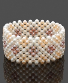 Polish your look with a chic cuff. This elegant design features a multitude of multicolored cultured freshwater pearls (4-5 mm) in a chic stretch design. Approximate length: 8 inches.