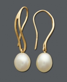 Add an element of effortless style. This timeless pair of earrings features a cultured freshwater pearl (7-8 mm) suspended from a rich, 14k gold setting. Approximate drop: 1-1/5 inches. Add an element of effortless style. This timeless pair of earrings features a cultured freshwater pearl (7-8 mm) suspended from a rich, 14k gold setting. Approximate drop: 1-1/5 inches.