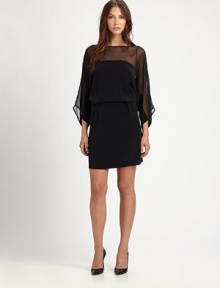 Semi-sheer paneling and dolman sleeves add a sultry spin to this exquisite, silk-trimmed silhouette. BoatneckSemi-sheer panelingThree-quarter dolman sleevesElastic waistbandBack keyhole closureAbout 18 from natural waistFully linedBody: TriacetateTrim: SilkDry cleanImportedModel shown is 5'9½ (176cm) wearing US size Small. Semi-sheer paneling and dolman sleeves add a sultry spin to this exquisite, silk-trimmed silhouette. BoatneckSemi-sheer panelingThree-quarter dolman sleevesElastic waistbandBack keyhole closureAbout 18 from natural waistFully linedBody: TriacetateTrim: SilkDry cleanImportedModel shown is 5'9½ (176cm) wearing US size Small.