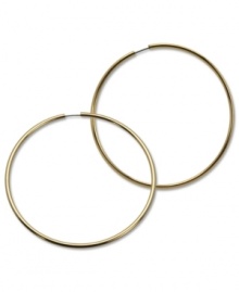 Infinite style with endless hoops. These GUESS earrings are crafted in gold tone mixed metal. Approximate diameter: 2-1/2 inches. Infinite style with endless hoops. These GUESS earrings are crafted in gold tone mixed metal. Approximate diameter: 2-1/2 inches.