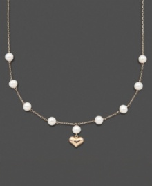 For the little girl who has stolen your heart. This illusion necklace features cultured freshwater pearls (5-6 mm) with a 14k gold dangling heart charm. Set in 14k gold. Approximate length: 13 inches. Approximate drop: 1/2 inch. For the little girl who has stolen your heart. This illusion necklace features cultured freshwater pearls (5-6 mm) with a 14k gold dangling heart charm. Set in 14k gold. Approximate length: 13 inches. Approximate drop: 1/2 inch.