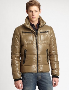 Constructed in Teflon® and complete with a hidden hood, this sporty coat is the ultimate winter essential. Stand collar with hidden hoodFront zip closureLong ribbed knit cuff sleevesChest and front zip pocketsLogo patch on armAbout 27 from shoulder to hemNylonFully linedFill: downDry cleanImported Constructed in Teflon® and complete with a hidden hood, this sporty coat is the ultimate winter essential. Stand collar with hidden hoodFront zip closureLong ribbed knit cuff sleevesChest and front zip pocketsLogo patch on armAbout 27 from shoulder to hemNylonFully linedFill: downDry cleanImported